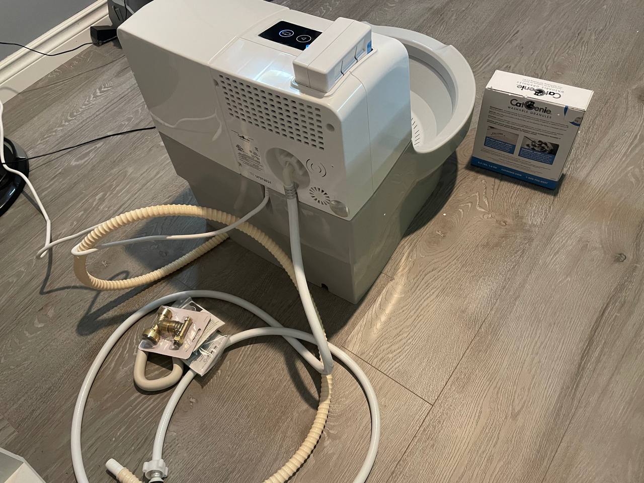 Parts of Cat Genie A.I. litter box