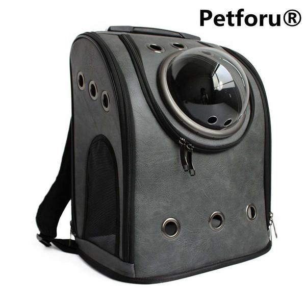 Leather Petforu cat travel bag with bubble window and lots of ventilation holes.