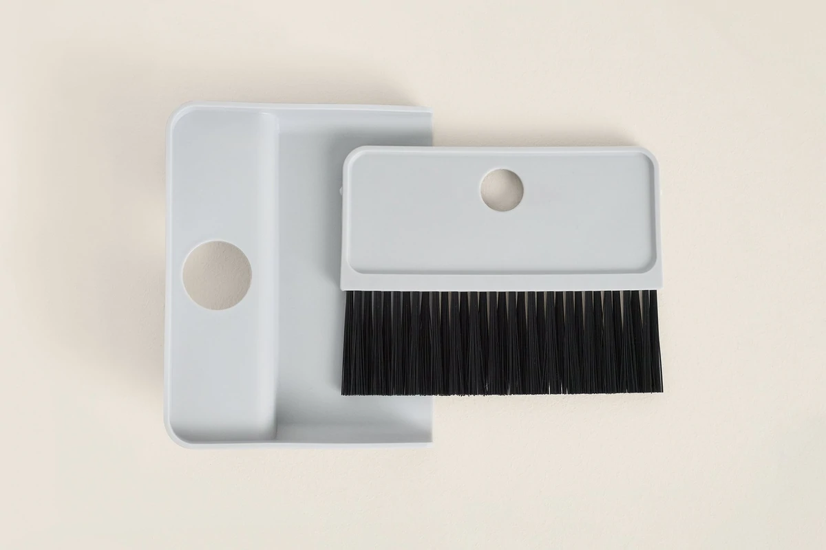 Tuft + Paw Cove Litter Box cleaning tool that come with cat litter