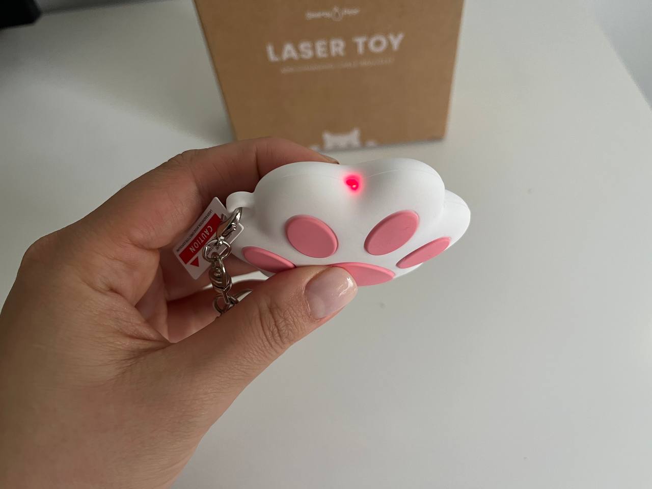 trying different laser patterns on smarty pear'a cat electronic toy