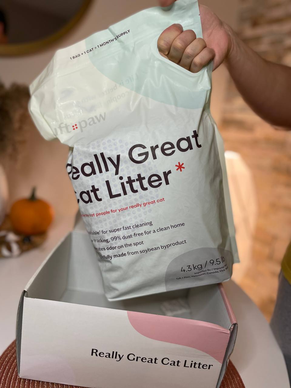 Comfortable handle of Really Great Cat Litter from Tuft + Paw