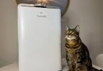 My cat is posing near Turonic PH950 Hepa Air Purifier