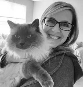 Jamey holding cat Milo